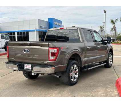 2021 Ford F-150 Lariat is a Grey 2021 Ford F-150 Lariat Truck in Bay City TX