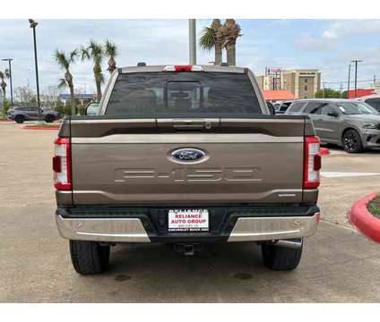 2021 Ford F-150 Lariat is a Grey 2021 Ford F-150 Lariat Truck in Bay City TX