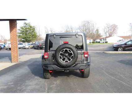 2014UsedJeepUsedWrangler UnlimitedUsed4WD 4dr is a Grey 2014 Jeep Wrangler Unlimited Car for Sale in Clinton IL