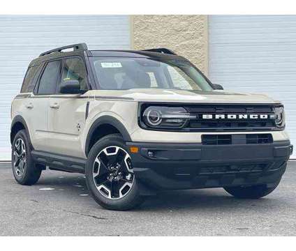 2024 Ford Bronco Sport Outer Banks is a Tan 2024 Ford Bronco SUV in Milford MA
