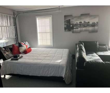 Beautiful fully furnished insulated double garage studio apartment for rent at 8862 Old Lee Rd in Lithia Springs GA is a Roommate