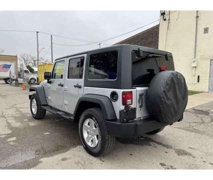 2011 Jeep Wrangler for sale is a Silver 2011 Jeep Wrangler Car for Sale in Oak Park MI