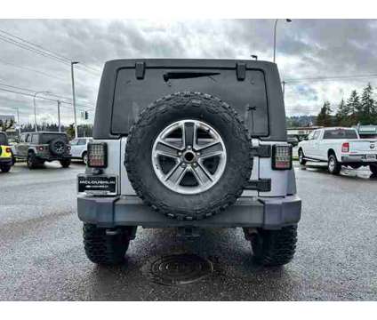 2017 Jeep Wrangler Unlimited Sport is a Silver 2017 Jeep Wrangler Unlimited Sport Car for Sale in Portland OR