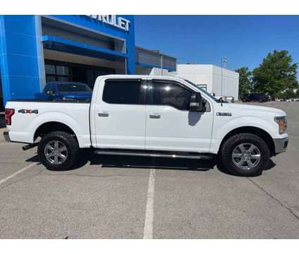 2018 Ford F-150 XLT is a White 2018 Ford F-150 XLT Car for Sale in Olathe KS