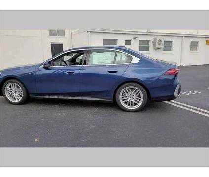 2024 BMW 5 Series i xDrive is a Blue 2024 BMW 5-Series Sedan in Jacksonville FL