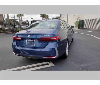 2024 BMW 5 Series i xDrive is a Blue 2024 BMW 5-Series Sedan in Jacksonville FL