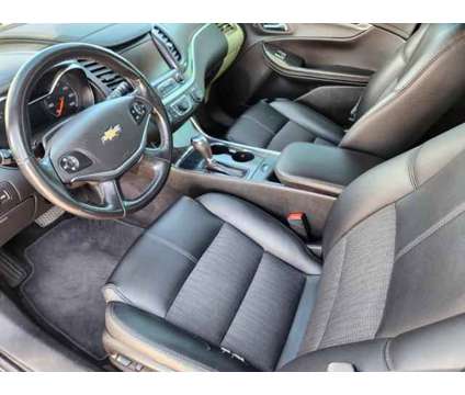 2018 Chevrolet Impala 1LT is a Black 2018 Chevrolet Impala 1LT Sedan in Cheyenne WY