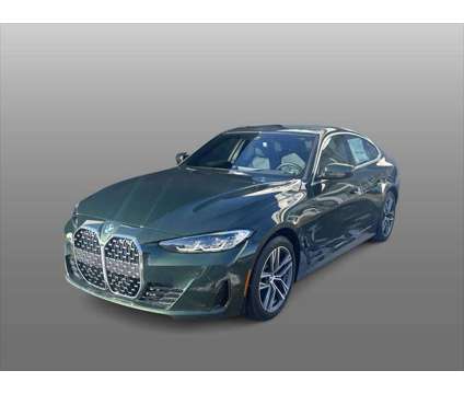 2024 BMW 4 Series 430i xDrive is a Green 2024 BMW 430 Model i Sedan in Anchorage AK