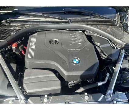 2024 BMW 4 Series 430i xDrive is a Green 2024 BMW 430 Model i Sedan in Anchorage AK