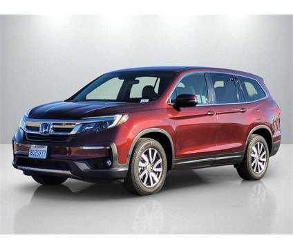 2021 Honda Pilot 2WD EX is a Red 2021 Honda Pilot 2WD EX SUV in El Centro CA