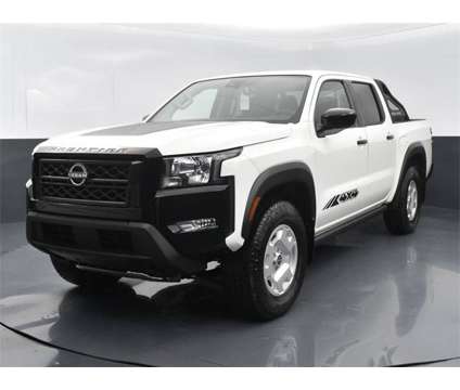 2024 Nissan Frontier SV is a White 2024 Nissan frontier SV Truck in Columbus GA