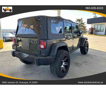 2015 Jeep Wrangler for sale is a Green 2015 Jeep Wrangler Car for Sale in Dubuque IA