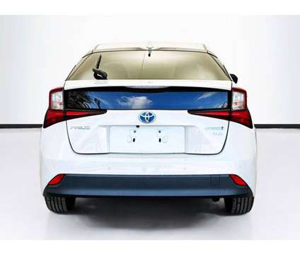 2021 Toyota Prius XLE is a White 2021 Toyota Prius Car for Sale in Bellflower CA
