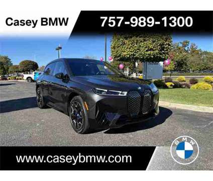 2024 BMW iX xDrive50 is a Grey 2024 BMW 325 Model iX SUV in Newport News VA