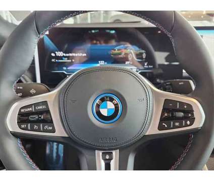 2024 BMW i4 M50 is a Green 2024 Sedan in Loveland CO