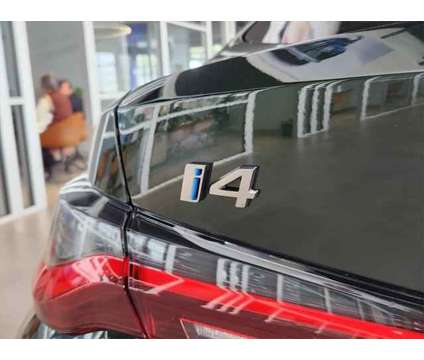 2024 BMW i4 M50 is a Green 2024 Sedan in Loveland CO