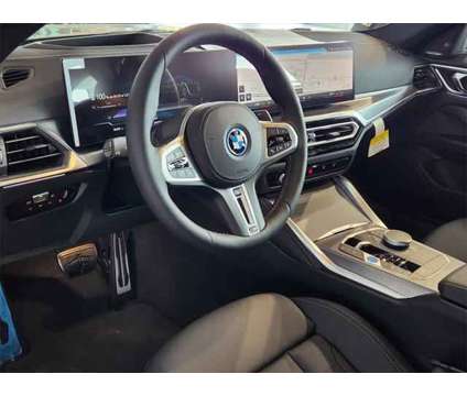 2024 BMW i4 M50 is a Green 2024 Sedan in Loveland CO