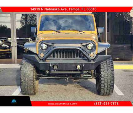 2014 Jeep Wrangler for sale is a Gold 2014 Jeep Wrangler Car for Sale in Tampa FL