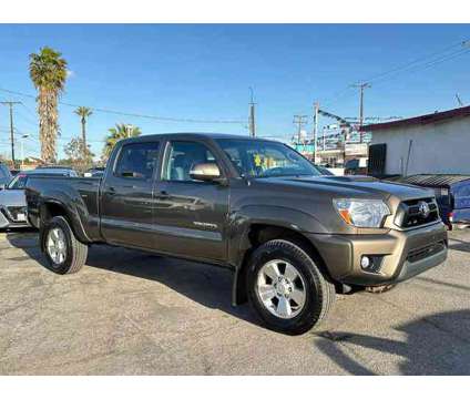 2015 Toyota Tacoma Double Cab for sale is a Brown 2015 Toyota Tacoma Double Cab Car for Sale in Ontario CA