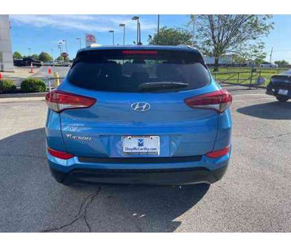 2016 Hyundai Tucson SE is a Blue 2016 Hyundai Tucson SE Car for Sale in Olathe KS