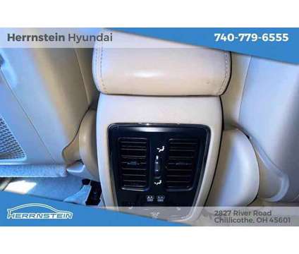 2014 Jeep Grand Cherokee Overland is a Tan 2014 Jeep grand cherokee Overland SUV in Chillicothe OH