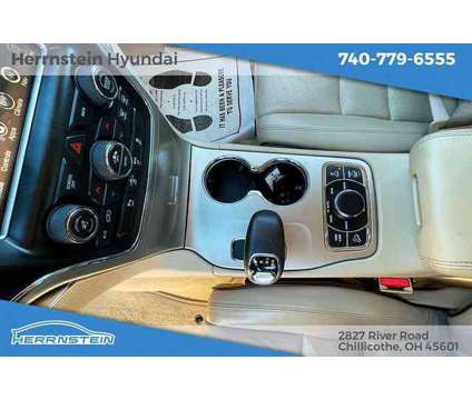 2014 Jeep Grand Cherokee Overland is a Tan 2014 Jeep grand cherokee Overland SUV in Chillicothe OH