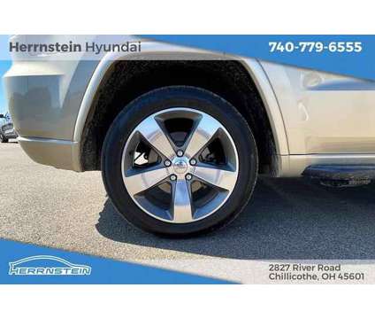 2014 Jeep Grand Cherokee Overland is a Tan 2014 Jeep grand cherokee Overland SUV in Chillicothe OH