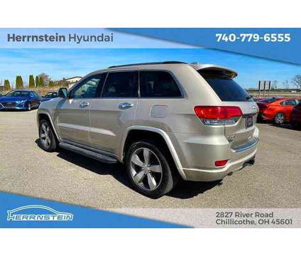 2014 Jeep Grand Cherokee Overland is a Tan 2014 Jeep grand cherokee Overland SUV in Chillicothe OH