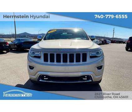 2014 Jeep Grand Cherokee Overland is a Tan 2014 Jeep grand cherokee Overland SUV in Chillicothe OH