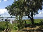 Majestic Riverfront Estate on St. Johns River with 20 Acres and 4 Bed 3 Bath