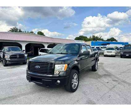 2014 Ford F150 SuperCrew Cab for sale is a Black 2014 Ford F-150 SuperCrew Car for Sale in Haines City FL