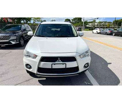 2010 Mitsubishi Outlander for sale is a White 2010 Mitsubishi Outlander Car for Sale in Miami FL