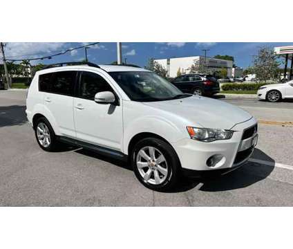 2010 Mitsubishi Outlander for sale is a White 2010 Mitsubishi Outlander Car for Sale in Miami FL