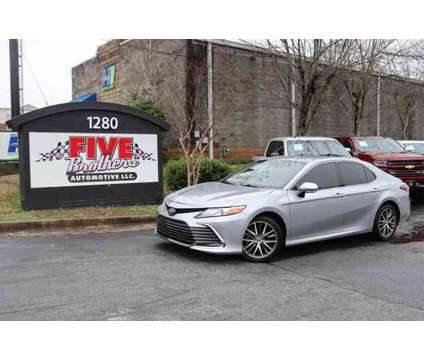 2022 Toyota Camry Hybrid for sale is a Silver 2022 Toyota Camry Hybrid Hybrid in Roswell GA