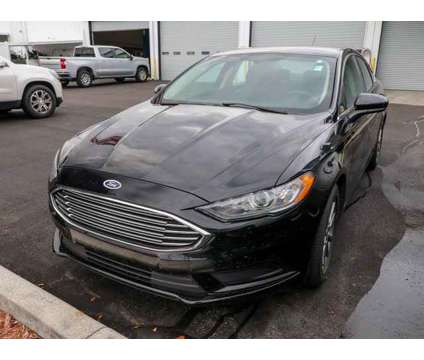 2017 Ford Fusion SE is a Black 2017 Ford Fusion SE Car for Sale in Homosassa FL