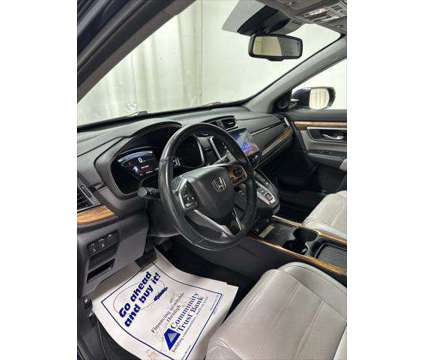 2021 Honda CR-V Hybrid Touring is a Blue 2021 Honda CR-V Hybrid in Pikeville KY