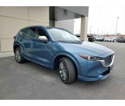 2024 Mazda CX-5 2.5 Turbo Signature is a Blue 2024 Mazda CX-5 SUV in Elmhurst IL
