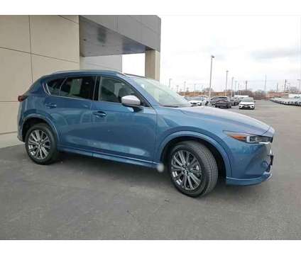 2024 Mazda CX-5 2.5 Turbo Signature is a Blue 2024 Mazda CX-5 SUV in Elmhurst IL