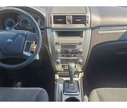 2011 Ford Fusion SE is a Black 2011 Ford Fusion SE Sedan in Brunswick OH