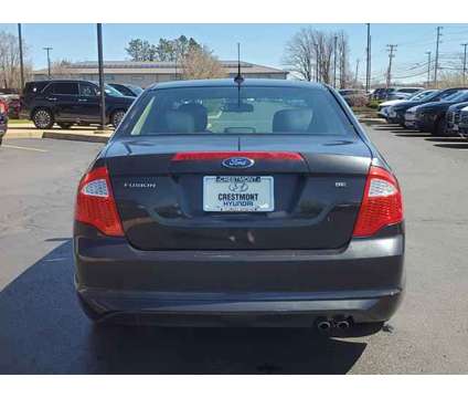 2011 Ford Fusion SE is a Black 2011 Ford Fusion SE Sedan in Brunswick OH