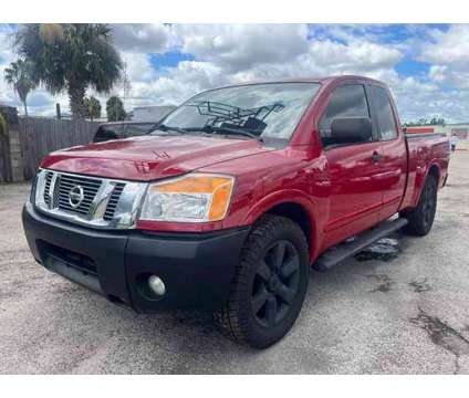 2012 Nissan Titan King Cab for sale is a Red 2012 Nissan Titan King Cab Car for Sale in Orlando FL