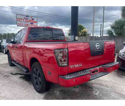 2012 Nissan Titan King Cab for sale is a Red 2012 Nissan Titan King Cab Car for Sale in Orlando FL