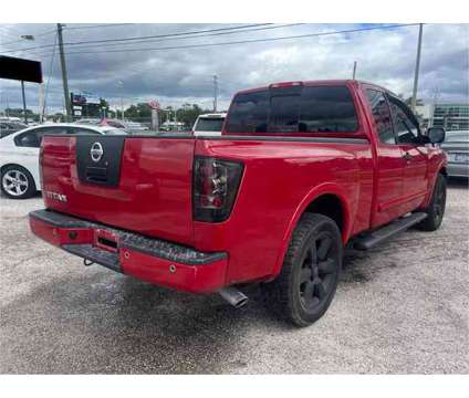 2012 Nissan Titan King Cab for sale is a Red 2012 Nissan Titan King Cab Car for Sale in Orlando FL
