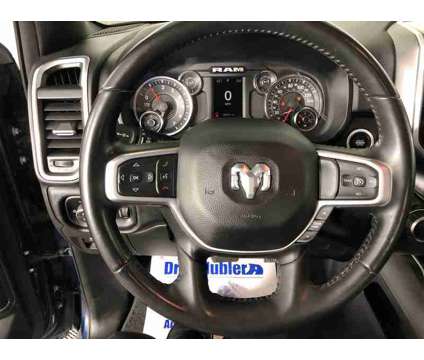 2021UsedRamUsed1500Used4x4 Quad Cab 6 4 Box is a Blue 2021 RAM 1500 Model Car for Sale in Shelbyville IN