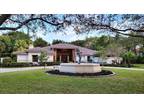 7700 S Woodridge Dr, Parkland, FL 33067