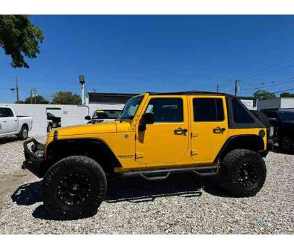 2015 Jeep Wrangler for sale is a Yellow 2015 Jeep Wrangler Car for Sale in Tampa FL
