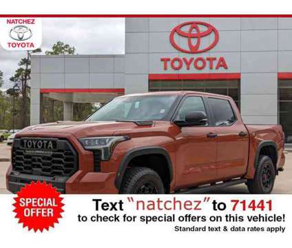 2024 Toyota Tundra TRD Pro Hybrid is a Orange 2024 Toyota Tundra TRD Pro Hybrid in Natchez MS