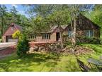 Custom Ranch on a glorious 6.5 private, wooded acres...