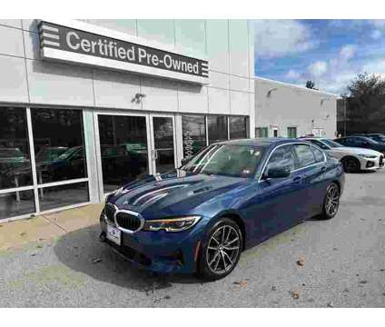 2021 BMW 3 Series 330i xDrive is a Blue 2021 BMW 3-Series Sedan in Manchester NH