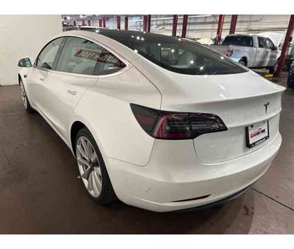 2019 Tesla Model 3 Mid Range is a White 2019 Tesla Model 3 Sedan in Chandler AZ